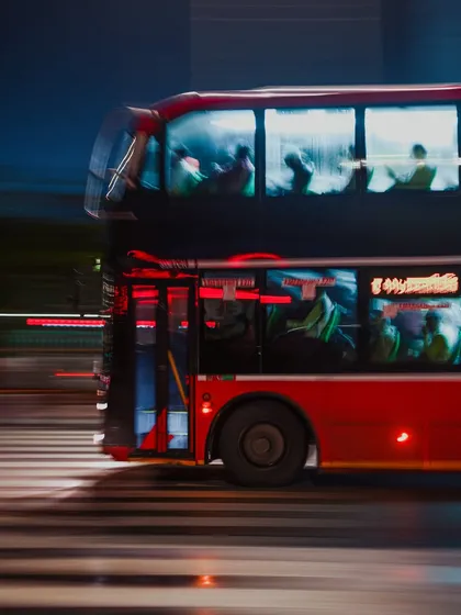 Using a panning motion, I captured the speed of a red double-decker bus at night. The blurred background and light trails convey the energy and constant movement of Mumbai's streets.