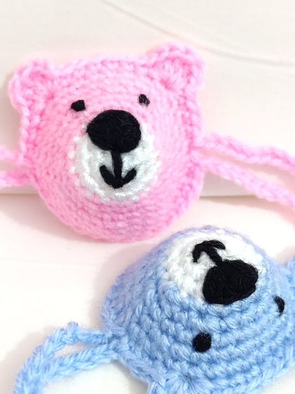 My funkiest creation yet, crochet nose warmers. I made these on a custom request in cute bear and flower designs.