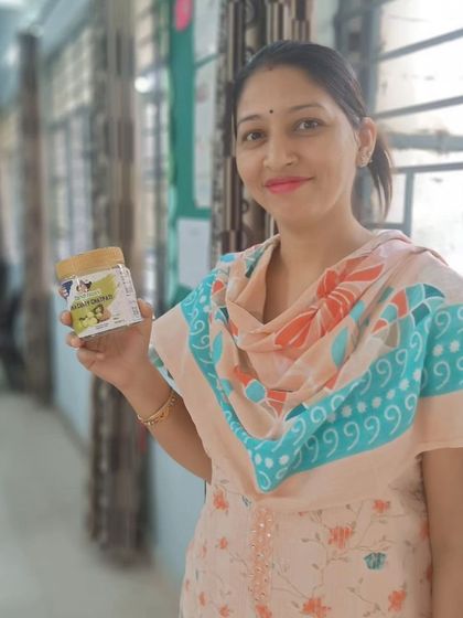 This customer proudly holds up a jar of our Amla Candy. It is wonderful to see our products being enjoyed by people from all walks of life.