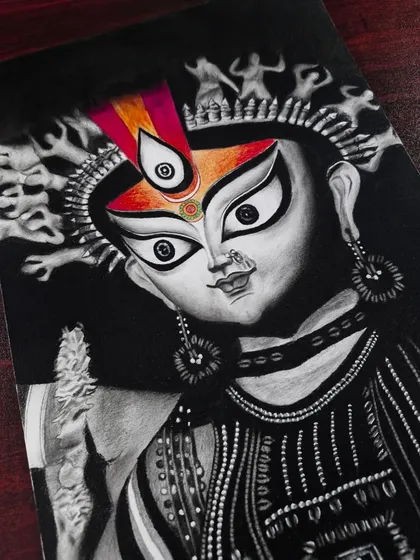A striking portrait of Maa Durga, using a black background and pops of color to create a powerful and traditional artistic style.