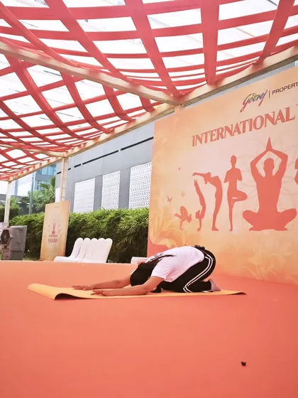Guiding participants into Balasana (Child's Pose). This is a wonderful resting pose that gently stretches the back and helps calm the nervous system.