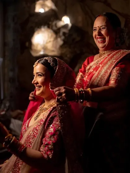 Another angle of the mother and daughter, capturing the laughter and love shared between them.