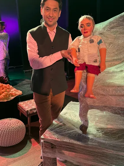On the set of the Gujarati film 'Maharani' with the puppet used for my cameo role. It's always fun to be in front of the camera as well as behind it.