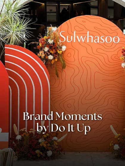 For the launch of the luxury beauty brand Sulwhasoo, we designed a custom backdrop that was a true reflection of their story. The warm, earthy tones and topographic line art speak to the brand's heritage and connection to nature, creating an artful and sophisticated brand activation.