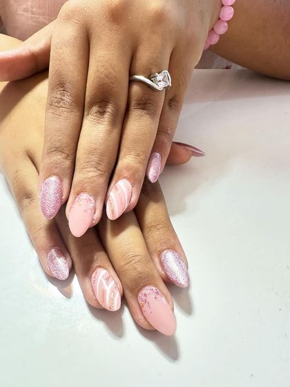 A soft and feminine design in pink, with glitter and subtle white stripes creating a beautiful texture.