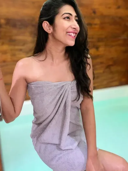 A smile after a rejuvenating float session. This therapy is designed to help balance hormones, improve skin health, and provide a powerful sense of well-being.