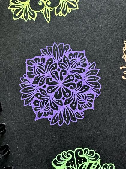 A purple mini mandala pattern, great for getting inspiration for your own designs.