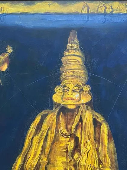 A detailed view of Aditya Basak's 'Kathakali' painting. The artist includes subtle details like fishermen in the background, creating a multi-layered narrative within the deep blue and gold composition.