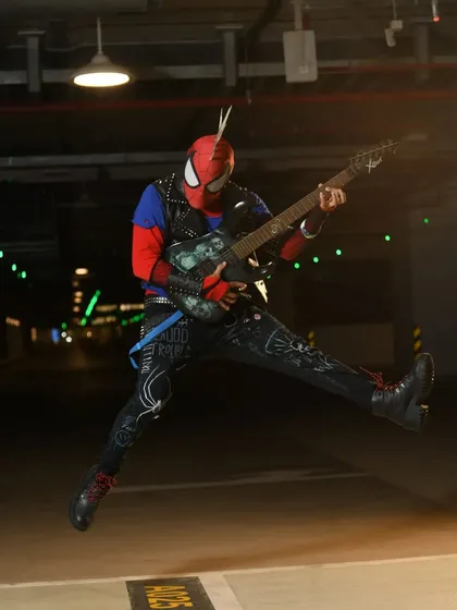 Sometimes, I don't just paint the characters, I become them. Here's my award-winning Spider-Punk cosplay, complete with a custom-painted guitar and hand-detailed suit.