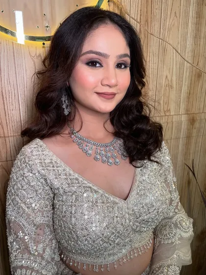 A portrait that captures the bride's confidence and the flawless finish of her makeup.
