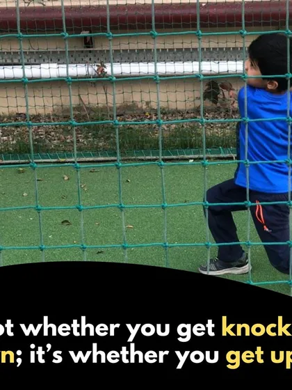 Every champion starts with the first step. This young player is practicing his swing in the nets, a core part of our training where we provide a safe and focused environment to hone batting skills.