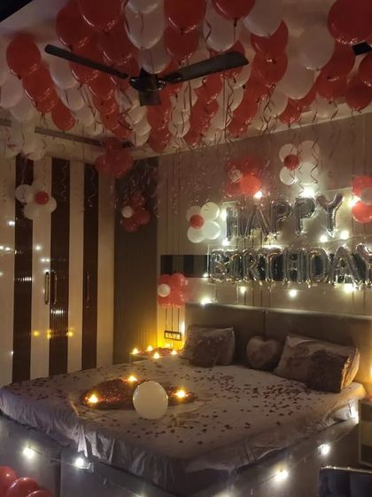 A full view of the decorated room, showing how our setup can completely transform a bedroom into a romantic celebration space.