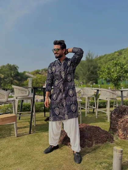 Posing by the sea in Goa. The relaxed, scenic vibe of Goa is perfect for a fun and beautiful wedding celebration.