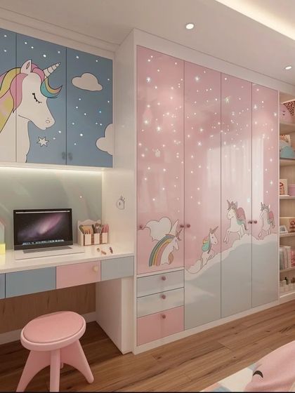 A magical unicorn-themed room with a full-wall wardrobe featuring sparkling pink and blue designs. The integrated desk and overhead cabinets create a complete and enchanting workspace.