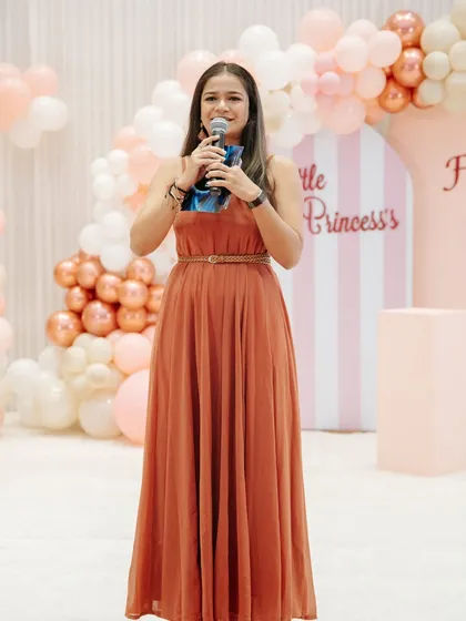 Hosting a baby name reveal ceremony, an event filled with sweet moments and happy feelings. It's a joy to be part of such intimate family celebrations.