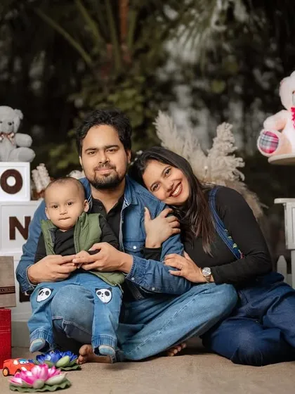 A beautiful family moment during a first birthday shoot. I always make sure to include parents in the celebration, capturing the love that surrounds the birthday boy.