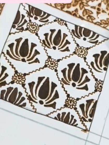 A beautiful grid made with repeating lotus motifs. This is a perfect way to carry a theme throughout a bridal design.