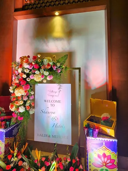 Another angle of the vibrant welcome area, showing the playful and artistic elements we incorporate to match the event's theme.