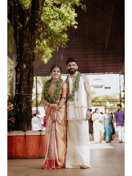 Orange Wedding Cinemas - Wedding Photography & Cinematography Timeless Kerala Traditions photo 121