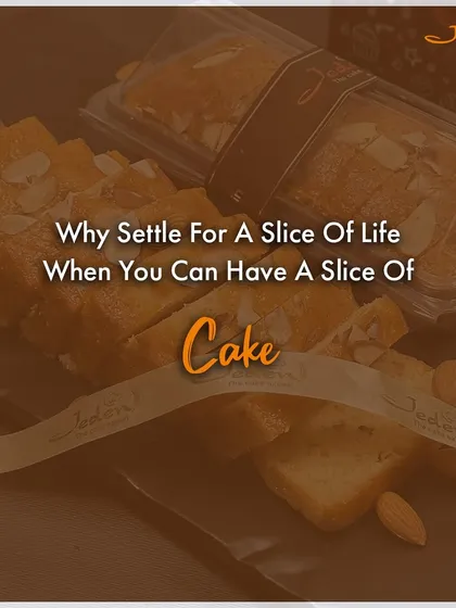 Why settle for a slice of life when you can have a slice of cake? This image features our classic Almond Slice Cake, perfectly portioned and ready to be enjoyed.