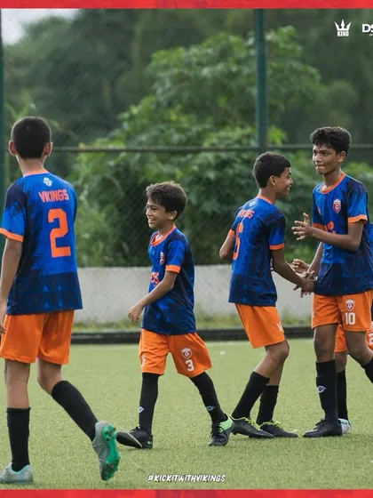 Another win in the books. The team celebrating a goal together, showcasing their great chemistry.