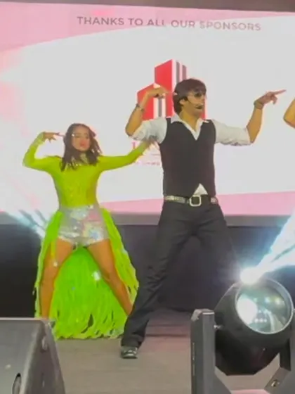 A synchronized dance move with my talented performers. Precision and style are key elements of our choreography.