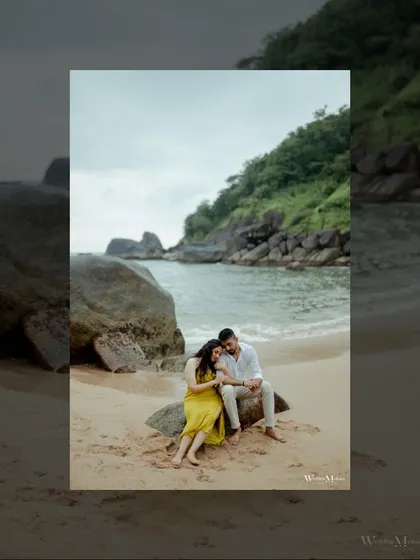 An artistic portrait of the couple sitting on a rock in Goa. The framing and composition give this image a quiet, contemplative feel, like a stolen moment of peace.