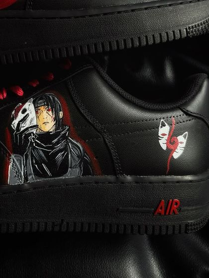 A detailed close-up of the Itachi Anbu mask portrait on the custom sneaker.