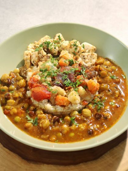 The Spice of Maharashtra: Kolhapuri Paneer Usal Bhaat: This dish celebrates the bold, fiery cuisine of Kolhapur. We use a house-made Ghoda Masala spice mix to flavor this hearty dish of paneer, mixed legumes (usal), and rice (bhaat).