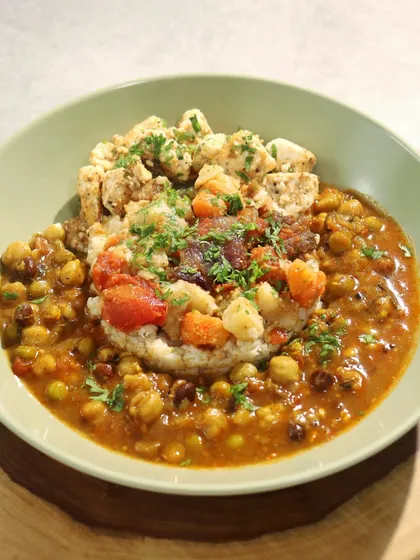 The Spice of Maharashtra: Kolhapuri Paneer Usal Bhaat: This dish celebrates the bold, fiery cuisine of Kolhapur. We use a house-made Ghoda Masala spice mix to flavor this hearty dish of paneer, mixed legumes (usal), and rice (bhaat).