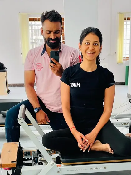 A quick photo with a client on the reformer. Her dedication is truly inspiring.