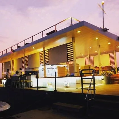 An earlier floating restaurant project we designed in Goa, captured at dusk. This project demonstrates our experience in creating unique waterfront hospitality venues, with a focus on open-air structures and atmospheric lighting that enhances the natural setting.