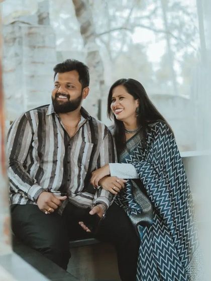 A candid, happy moment between a couple. We love capturing the genuine smiles and laughter that you share.