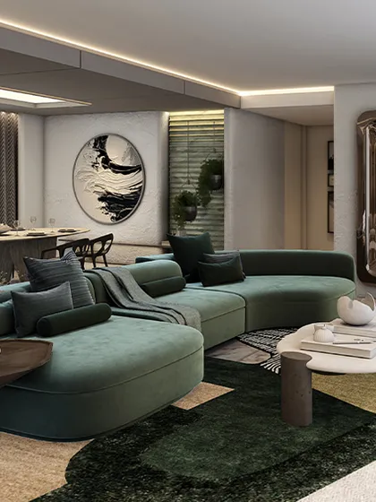 A closer view of a living space where quiet luxury meets bold narratives. The deep teal curved sofa is complemented by abstract art and a layered rug, creating a well-defined spatial flow that balances refinement and warmth without feeling rigid or austere.
