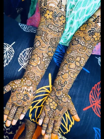 This bridal design for Feroz features her name hidden amongst a dense pattern of flowers and traditional motifs, a special touch for her big day.