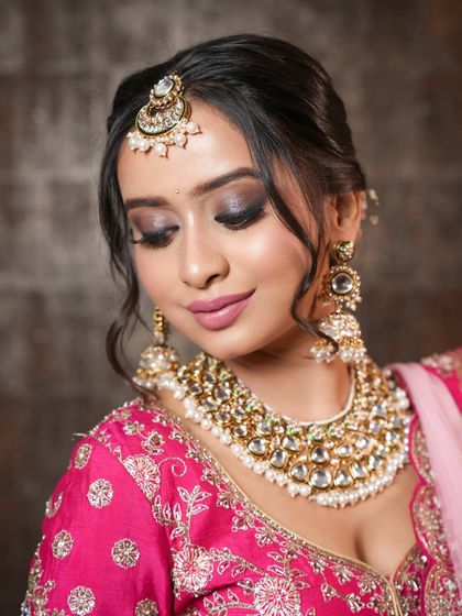 Another angle of the soft smokey eye, showing the beautiful blending and shimmer. This look is perfect for brides who want a touch of drama that still feels soft and romantic.