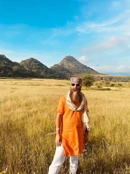 A confident pose in a golden field. Embrace your own light and do not be dimmed by the opinions of others. Let your presence speak for itself.