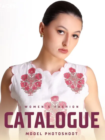 This image showcases the delicate scalloped neckline of a white printed top. The focus on detail is crucial for e-commerce photography that aims to inform the customer.