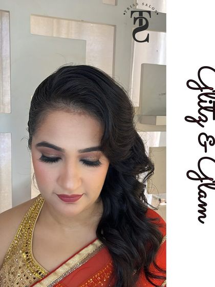 This is an example of my subtle party makeup. The look features soft, shimmery eyeshadow, defined lashes, and a neutral lip color, creating an elegant and glamorous effect that is not overpowering.