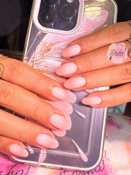 Simple, clean, and elegant. A beautiful set of natural-looking pink nails.