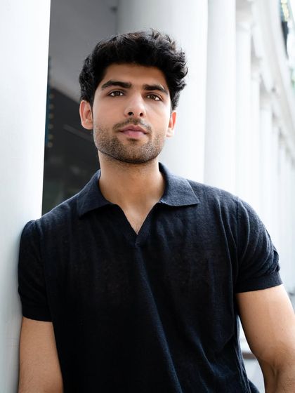 A direct and engaging portrait of a model looking at the camera. This kind of shot is crucial for a portfolio, showing confidence and connecting with the viewer.