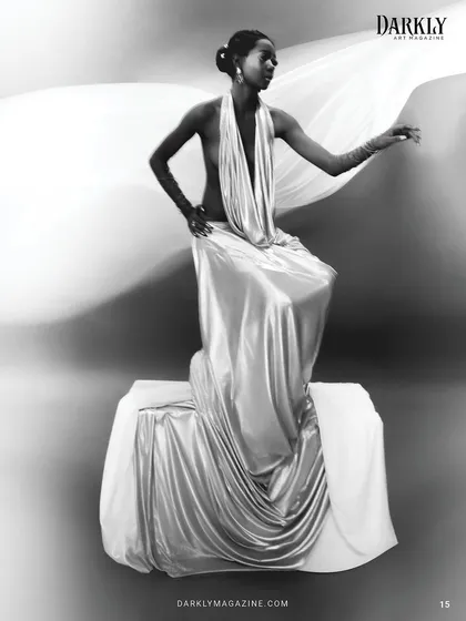 An inside look at the "Ascension" editorial. The makeup and hair are sculpted to create a statuesque, almost divine quality, transforming fashion into a piece of art.