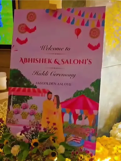 A personalized welcome sign for Abhishek and Saloni's Haldi ceremony, featuring custom illustrations.