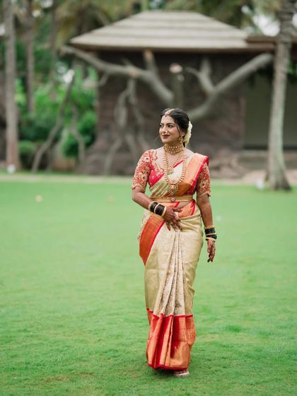 Every bride deserves to feel her most confident and beautiful self. Here, my bride is captured in a candid moment, her dewy makeup glowing in the natural light.