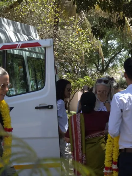 Our staff warmly welcomes international guests as they arrive for their retreat. This moment captures the beginning of their journey, filled with anticipation for the healing and rejuvenation to come.