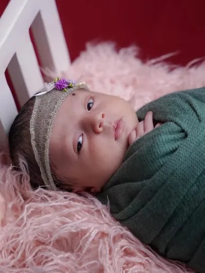 A precious moment of wakefulness. Even when babies are awake, I can capture their beautiful, curious eyes and calm demeanor.