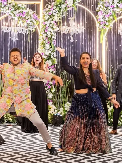 Whether it is for a sangeet or a corporate event, I love bringing people together on the dance floor. This candid shot captures the pure joy and high energy of a group performance we choreographed for a wedding celebration.