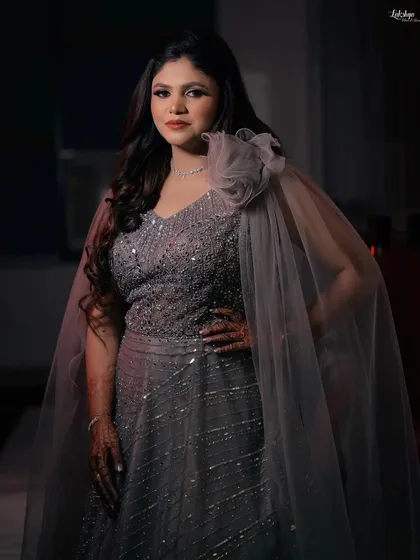A glamorous portrait of the bride, showcasing her sparkling gown and beautiful hair and makeup.