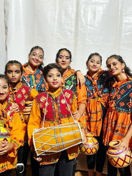 The girls' folk dance team, united and ready to perform. We foster a sense of teamwork and pride in our cultural dance groups.