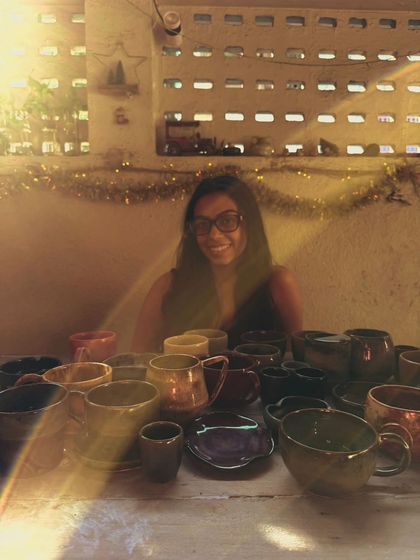 Hithika at her first-ever market sale, surrounded by the incredible collection of work she created at the studio. We are so proud to be part of her journey.